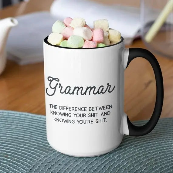 Grammar the Difference Between Knowing Your Shit 15oz. Black Handle Mug